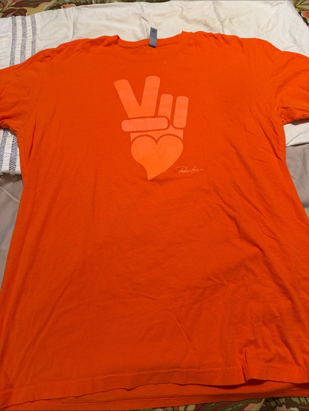 Orange Graphic Tee with Peace & Heart Design